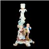 Image 8 : A pair of Meissen candlesticks.