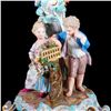 Image 9 : A pair of Meissen candlesticks.