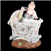 Image 1 : Porcelain mother and crib.