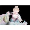 Image 2 : Porcelain mother and crib.