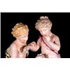 Image 2 : Bisque figures of children.