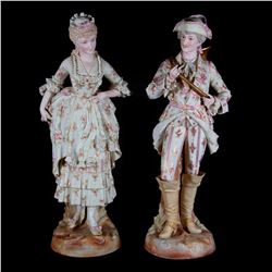 A pair of bisque figures.