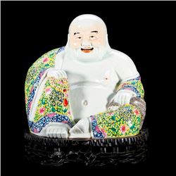 A Chinese porcelain Buddha.