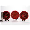 Image 9 : Three commemorative lacquerware plates.