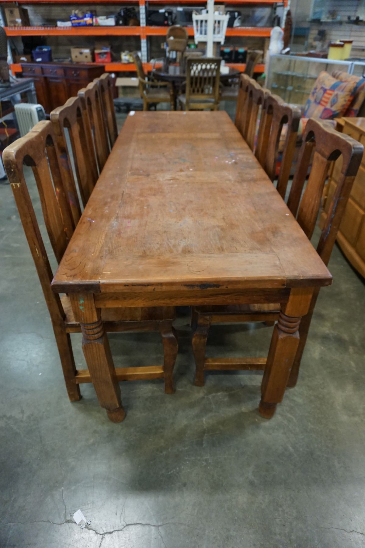 LARGE RUSTIC HARVEST TABLE 8FT BY 32IN AND 8 WOOD CHAIRS