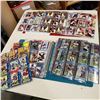 Image 1 : RED BINDER OF HOCKEY AND FOOTBALL CARDS
