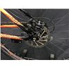 Image 2 : ORANGE AND BLACK RAPIDO PRO 1.75 24 SPEED FRONT SUSPENSION MOUNTAIN BIKE WITH FRONT AND REAR