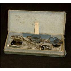 Box with antic eyeglasses