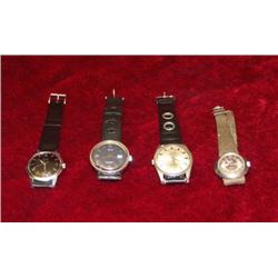 Lot of 4 Wristwatches, steel