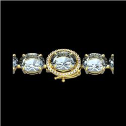 79 ctw Sky Blue Topaz & Micro Diamond Bracelet 14K Yellow Gold