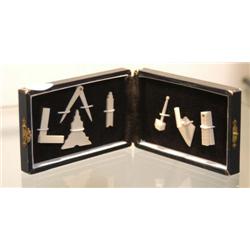 BOXED SET OF SEVEN MASONIC TOOL CHARM