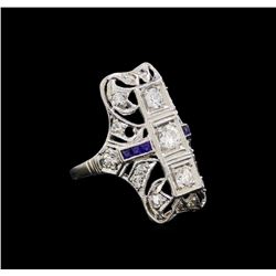 0.59 ctw Diamond and Sapphire Ring - Platinum