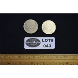 Lot of Two (2) Voyageur Dollar Coins