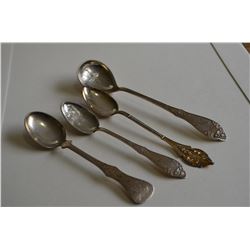 Four 830S silver spoons