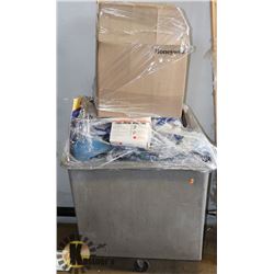 ROLLING GARBAGE CAN W/MOSTLY NEW HARDHATS