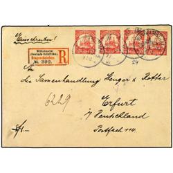 GERMAN ORIENTAL AFRICA  7 1/2 h. carmine, pair + two singles