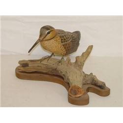 9" WOODCOCK BIRD CARVING ON A WOODEN BA