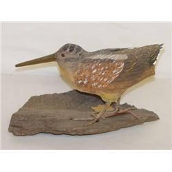 9 1/2" WOODCOCK BIRD CARVING ON A WOODE