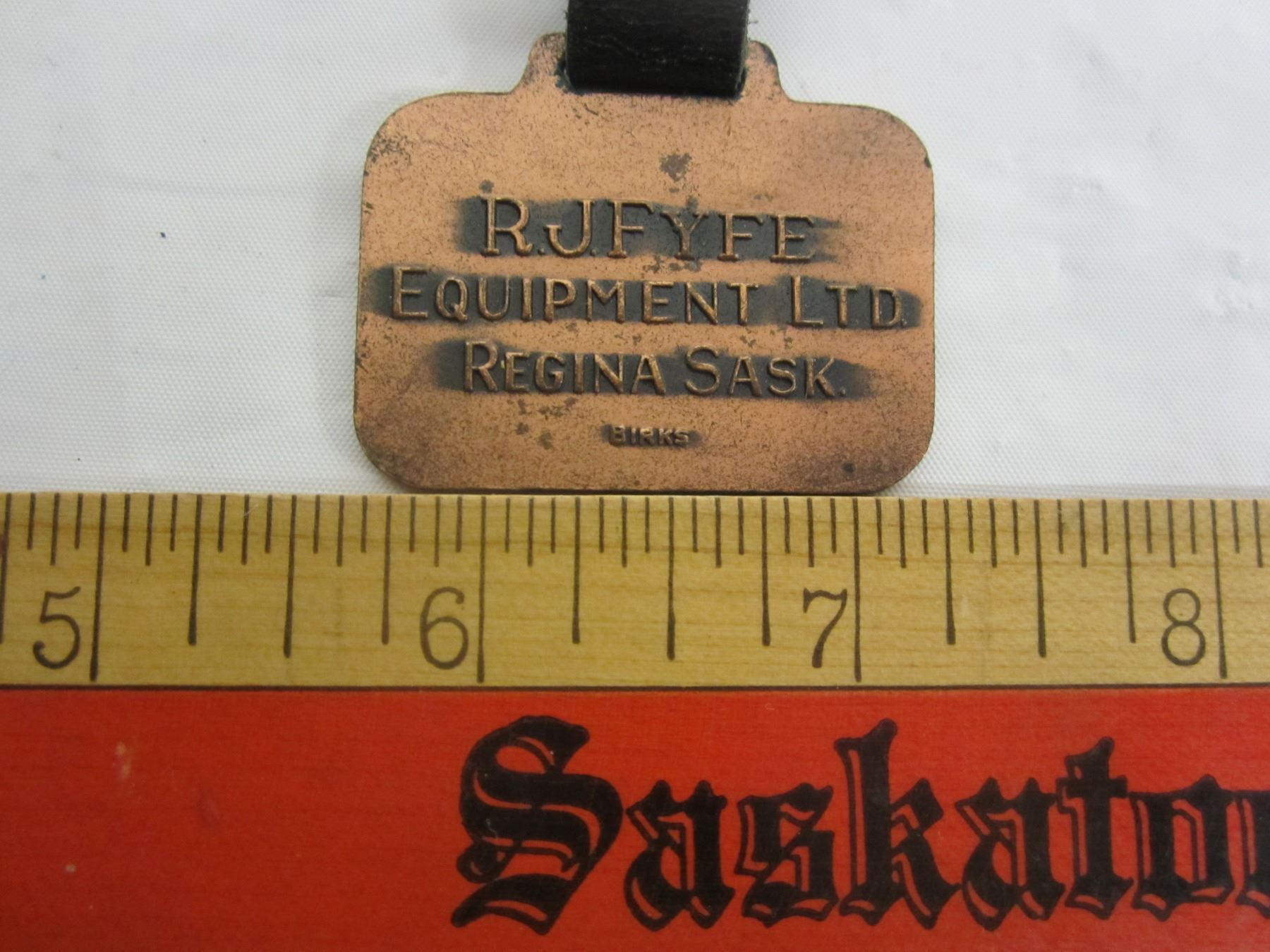 International Harvester watch fob Schmalz Auctions