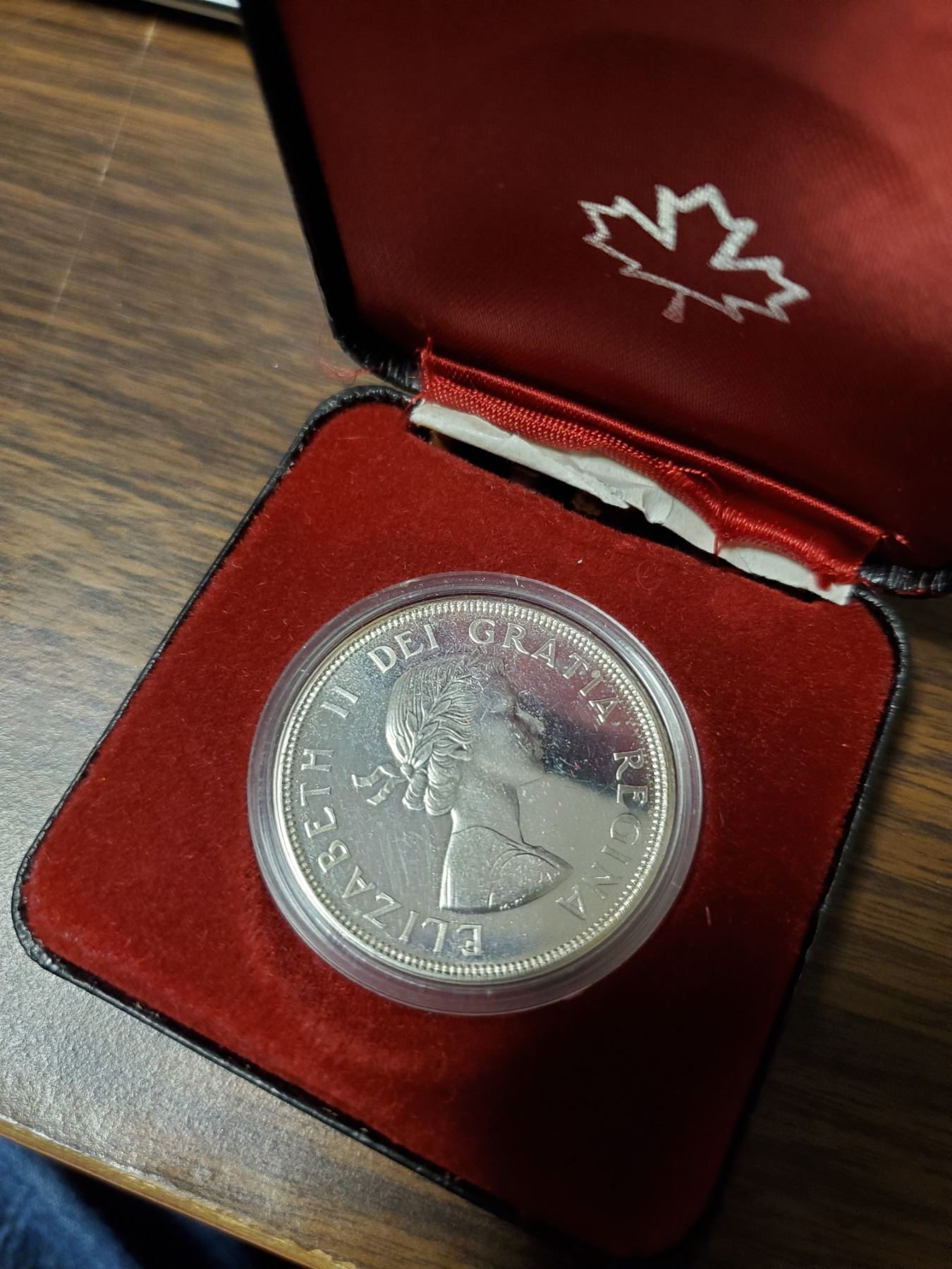 11984 Canadian silver dollar in black case,1dollar Schmalz Auctions 11984 Canadian silver dollar in black case,1dollar Schmalz Auctions