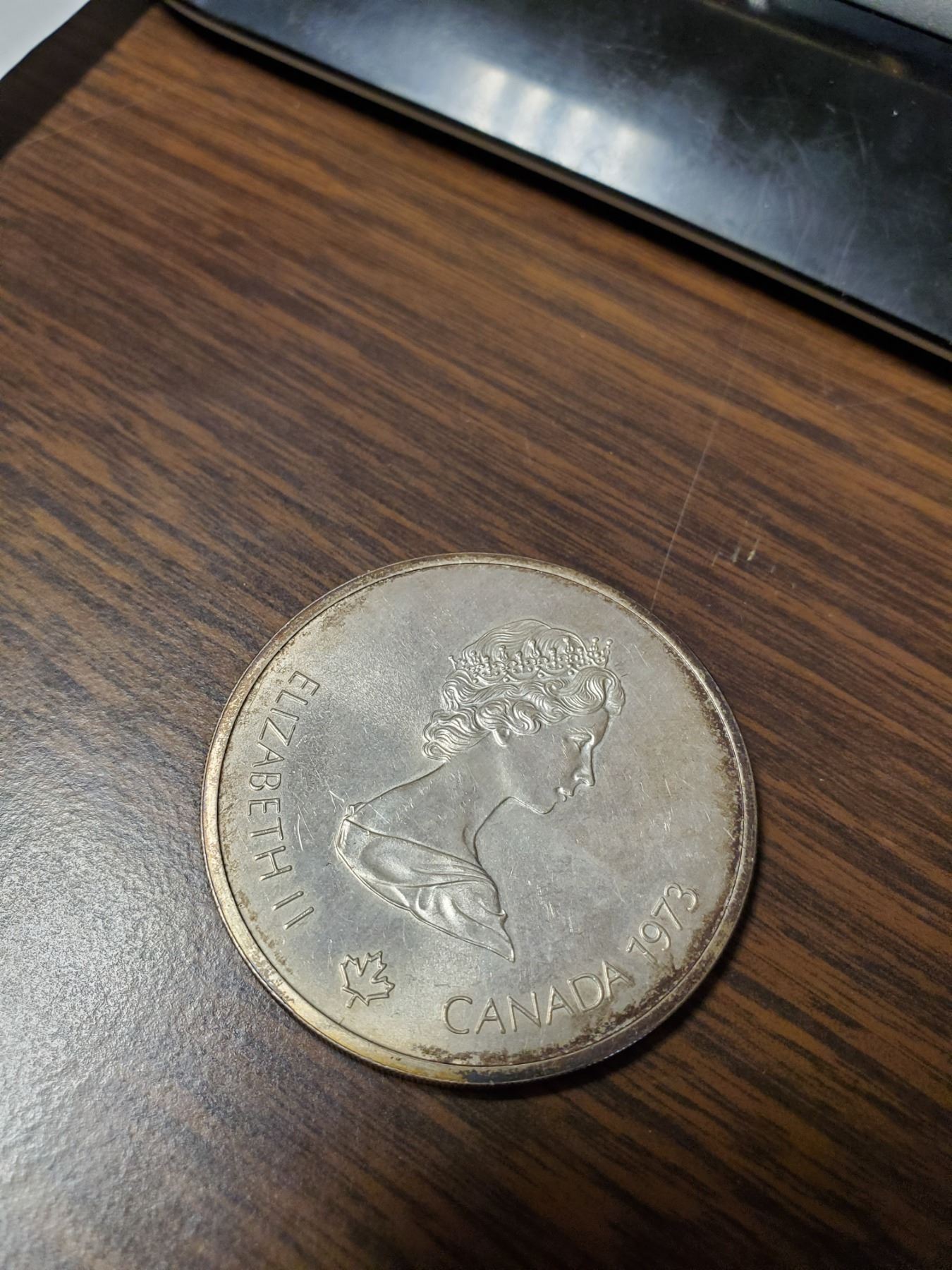 1973 Montreal Olympics “Montreal” 10 dollar .925 silver coin (32.00