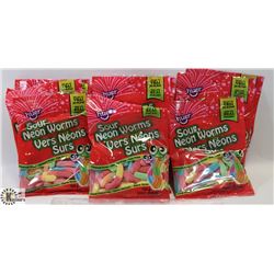 LARGE BAG OF HUER SOUR NEON WORMS CANDY.
