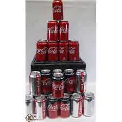 MILK CRATE FULL OF ASSORTED 355ML CANS OF COCA COLA
