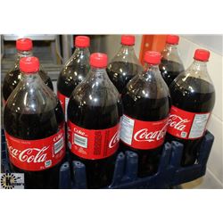 8- 2LTR BOTTLES OF ORIGINAL COCA COLA POP.