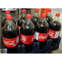8- 2LTR BOTTLES OF ORIGINAL COCA COLA POP.