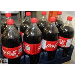 8- 2LTR BOTTLES OF ORIGINAL COCA COLA POP.