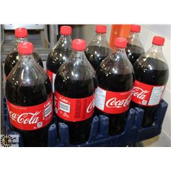8- 2LTR BOTTLES OF ORIGINAL COCA COLA POP.