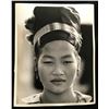 Image 1 : EDDIE ADAMS (1933-2004): HMONG WOMAN WITH HEADDRESS.