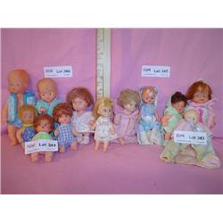 Tray of 12 Tiny Dolls. Plastic  Vinyl