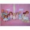 Image 1 : Tray of 12 Tiny Dolls. Plastic  Vinyl