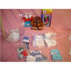 Tray of Assorted Doll Clothes. 6 Packag