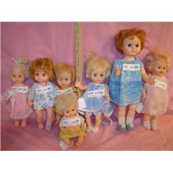 Tray of 7 Dolls: Plastic/Vinyl. All hav
