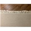 Image 2 : BEIGE WOVEN FRINGED AREA RUG 92" X 65"