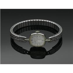 A LADY'S GOLD WRISTWATCH, Movado 14k Timepiece A LADY'S GOLD WRISTWATCH