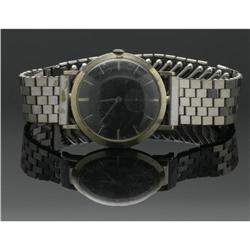 A MEN'S WHITE GOLD WRIST WATCH, BULOVA A MEN'S WHITE GOLD WRIST WATCH