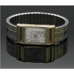 A MAN'S GOLD WRIST WATCH, LONGINES A MAN'S GOLD WRIST WATCH