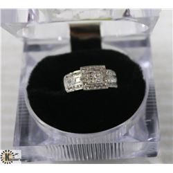 .925 STERLING SILVER RING WITH CZs - SIZE 7 -