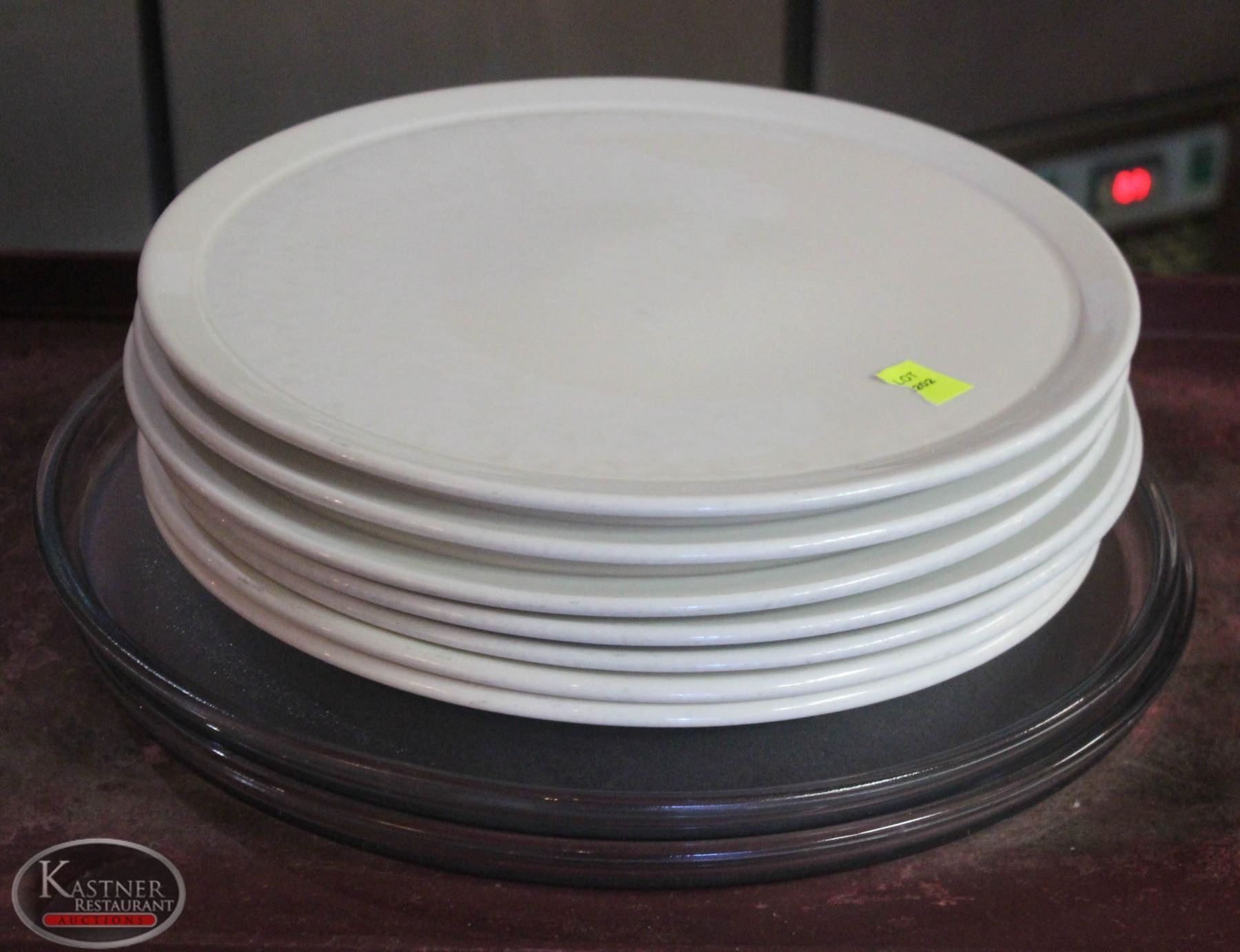 LOCATION 1. LOT OF 9 ASSORTED PIZZA SERVING PLATES