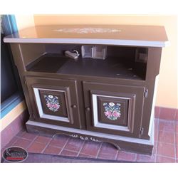 LOCATION #1. BROWN HANDPAINTED 2 DOOR WOODEN CABINET