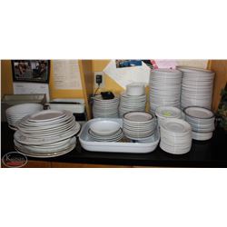 LOCATION #1. LARGE ASSORTED SAUCERS, SIDE PLATES, DINNER PLATES