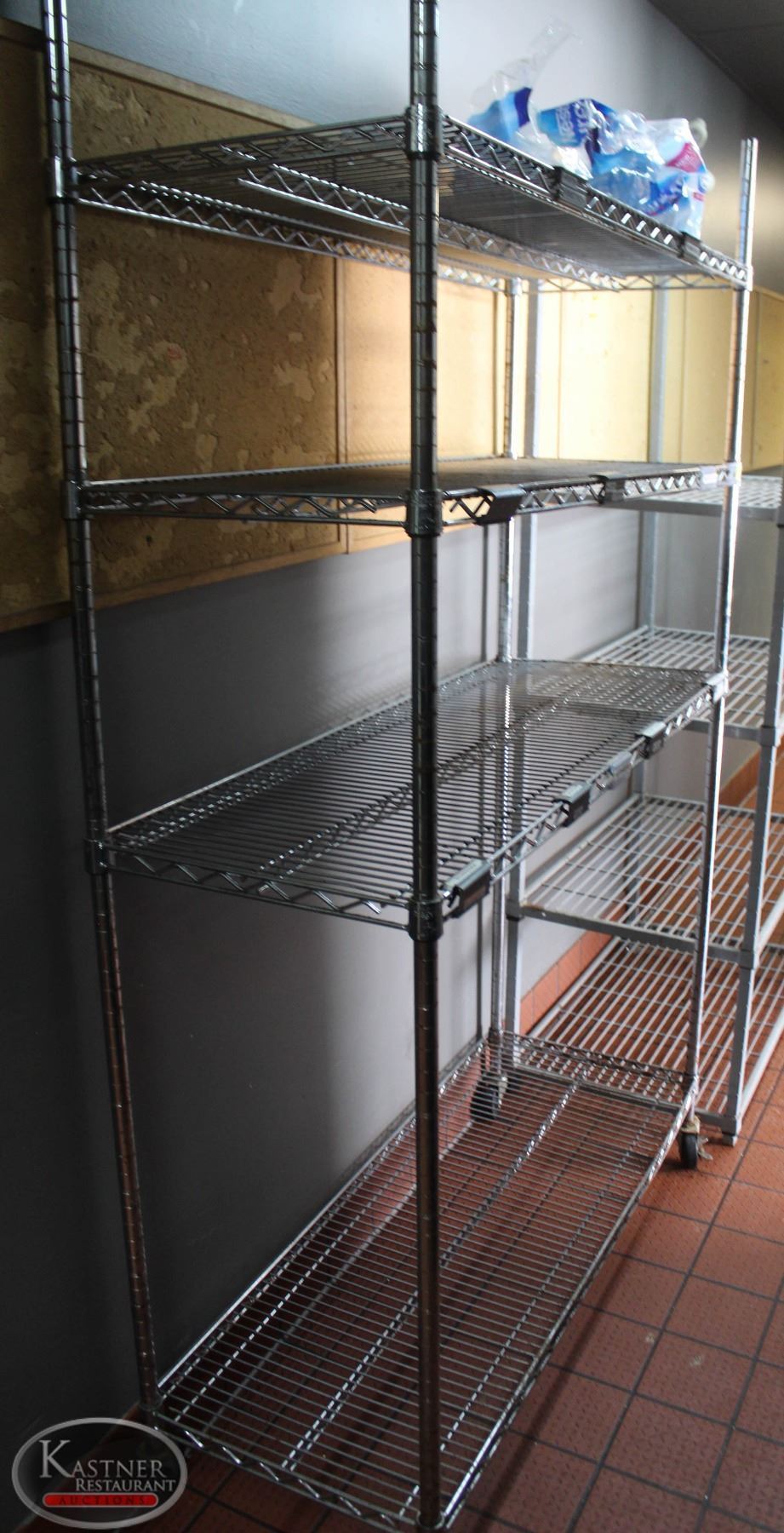LOCATION #2. 4 TIER CHROME WIRE RACK ON CASTORS 48