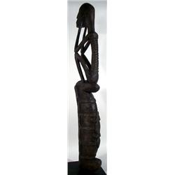 AN ASMAT SCULPTURE
