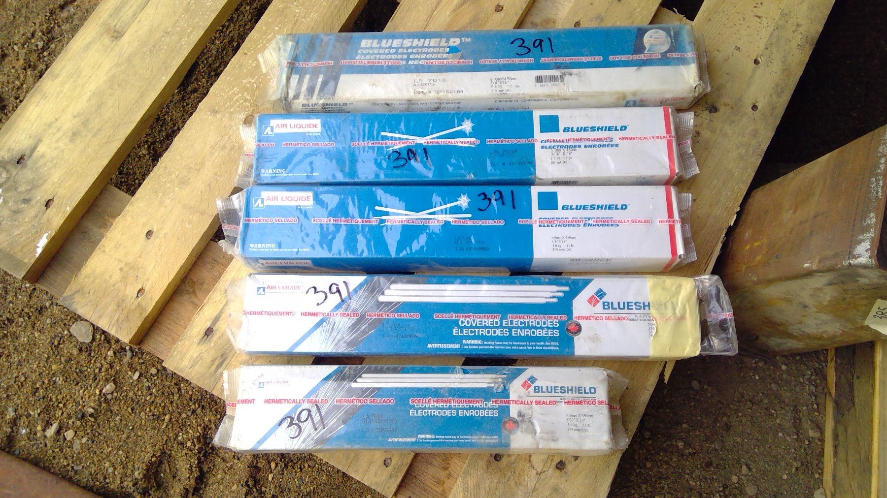 FIVE BOXES OF WELDING RODS