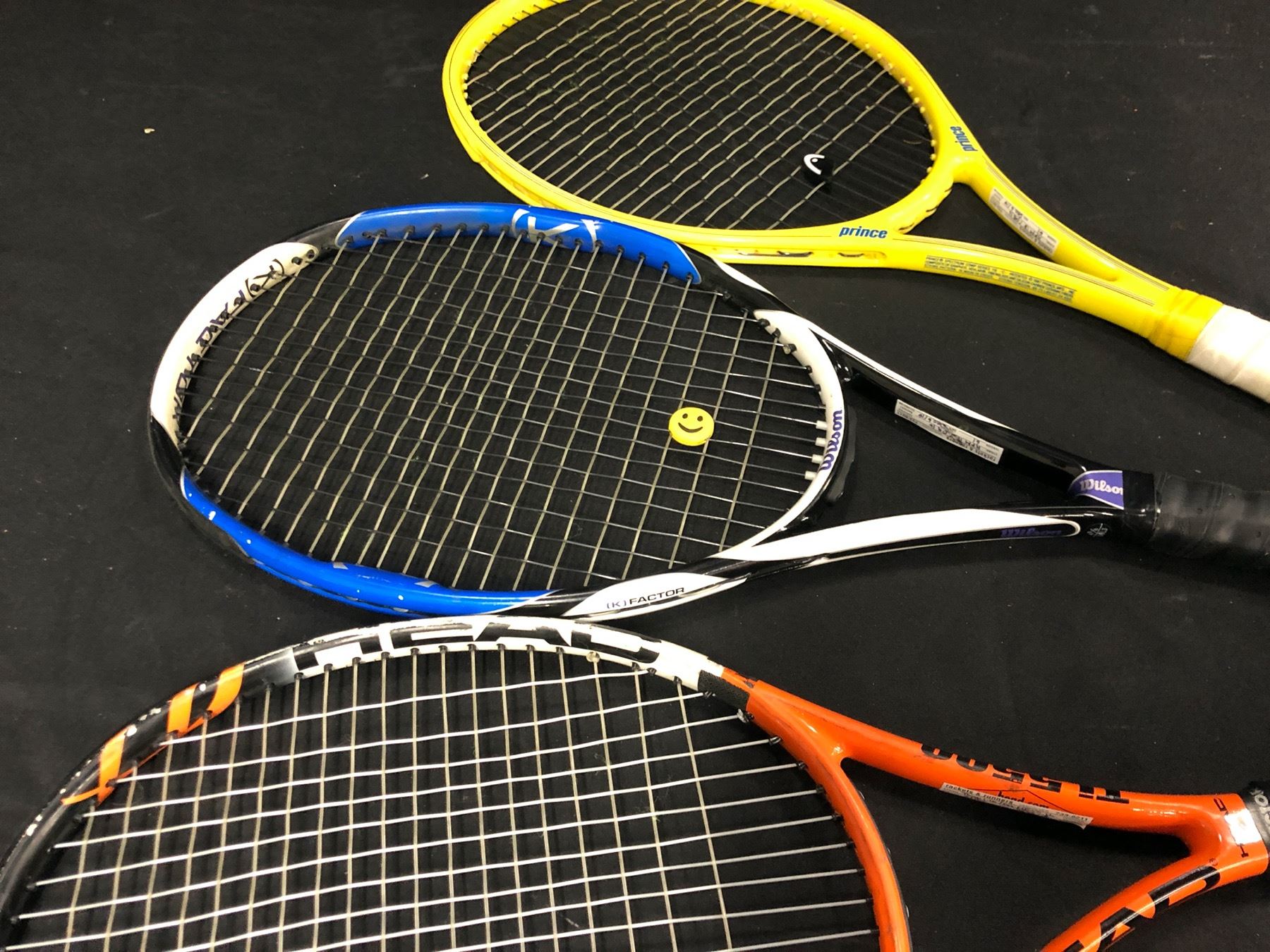 4 TENNIS RACQUETS INC. HEAD, 2 WILSON RACqUETS, AND PRINCE, COMES WITH ...