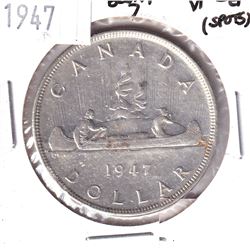 1947 Canada Silver $1 Blunt 7 VF-EF (Spots).