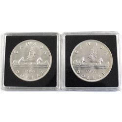 Pair of both Varieties 1957 Silver $1, Receive a Full Water Lines and 1 Water Line. Coins are AU to 
